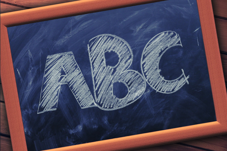 Image of chalkboard with ABC written on it