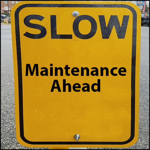 Slow, Maintenance Ahead sign