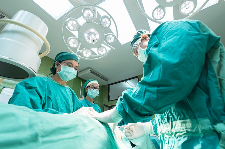 Nurses and doctor in operating room during surgery